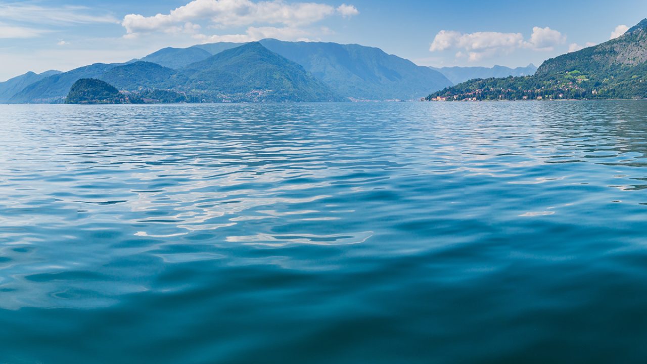 lake-como-italy-summer-coast-hazy-view-from-ship-2026-01-09-13-43-29-utc